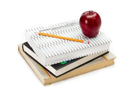 Apples on books Stock Photos