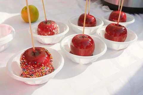 Apples in caramel Stock Photos