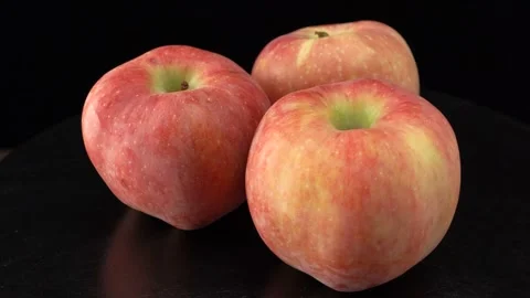 Apples close up on black background Stock Footage 140534663