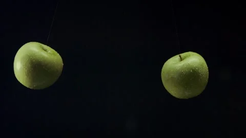 Apples collide with each other, shooting video from hands Vídeos de archivo 327572355
