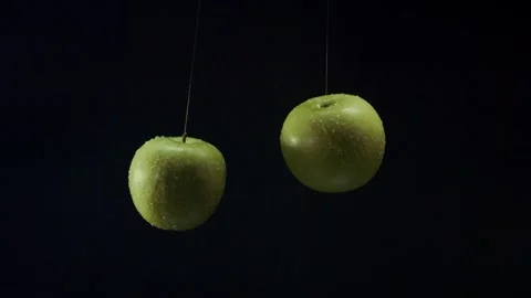 Apples collide with each other, shooting video from hands Stock Footage 327572524