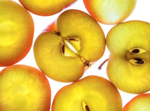 Apples, cut into pieces Stock Photos