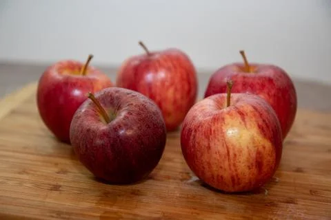 Apples on a cutting board Stock Photos