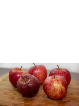Apples on a cutting board Stock Photos
