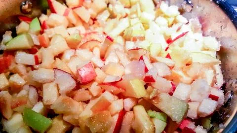 Apples diced in sugar. Stock Photos