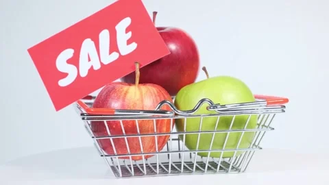 Apples of different colors, red and green rotate on white background in shopping Stock-Footage 247177593