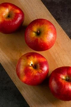 Apples in a dramatic low key concept with a dark background in variety angles Stock Photos
