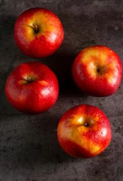 Apples in a dramatic low key concept with a dark background in variety angles Stock Photos