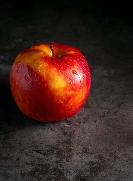Apples in a dramatic low key concept with a dark background in variety angles Stock Photos