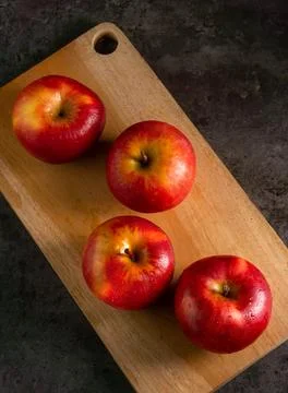 Apples in a dramatic low key concept with a dark background in variety angles Stock Photos
