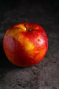 Apples in a dramatic low key concept with a dark background in variety angles Stock Photos