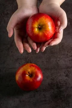 Apples in a dramatic low key concept with a dark background in variety angles Stock Photos
