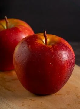 Apples in a dramatic low key concept with a dark background in variety angles Stock Photos