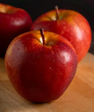 Apples in a dramatic low key concept with a dark background in variety angles Stock Photos