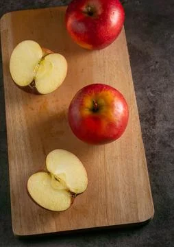 Apples in a dramatic low key concept with a dark background in variety angles Foto stock