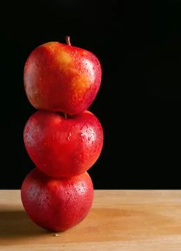 Apples in a dramatic low key concept with a dark background in variety angles Stock Photos