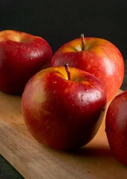 Apples in a dramatic low key concept with a dark background in variety angles Stock Photos