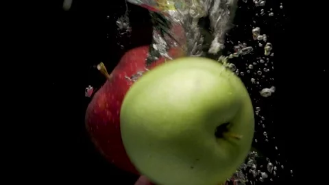 Apples Dropped in Water Stock Footage 146569569