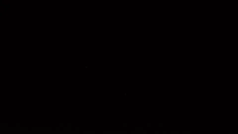 Apples falls into the water in slow motion. Black background Stock Footage 131036664