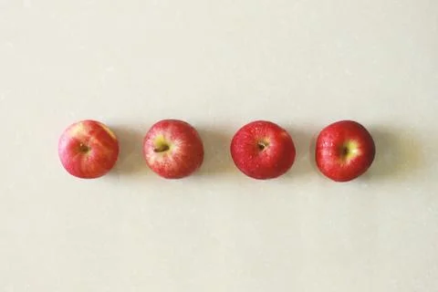 Apples on floor Stock Photos