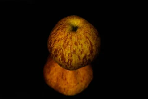 Apples on isolated black background Stock Photos