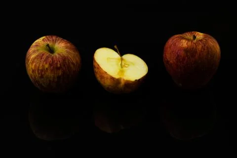 Apples on isolated black background Stock-Fotos