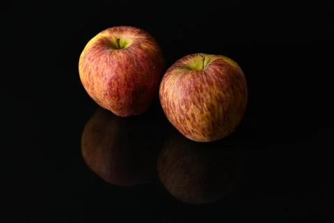 Apples on isolated black background Stock Photos