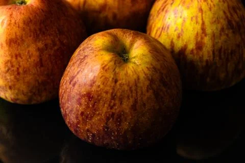 Apples on isolated black background Stock Photos