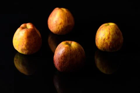 Apples on isolated black background Stock Photos