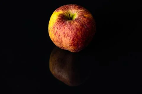 Apples on isolated black background Stock Photos