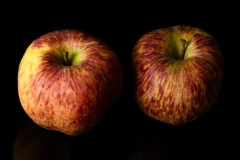 Apples on isolated black background Stock Photos