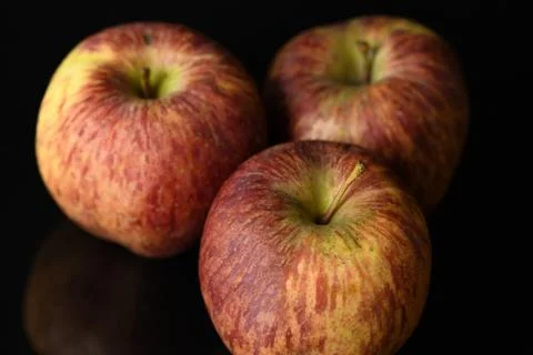 Apples on isolated black background Stock-Fotos