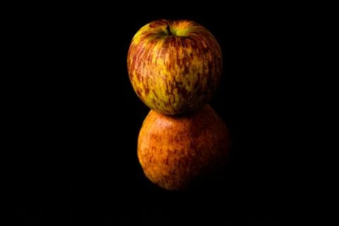 Apples on isolated black background Stock Photos