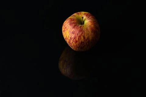 Apples on isolated black background Stock Photos