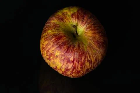 Apples on isolated black background Stock Photos