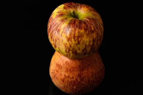 Apples on isolated black background Stock Photos