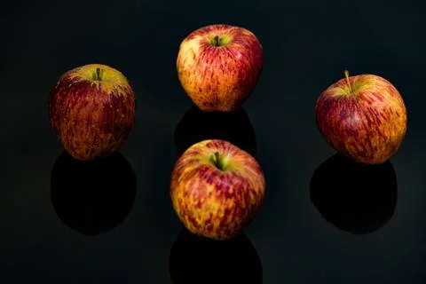 Apples on isolated black background Stock-Fotos