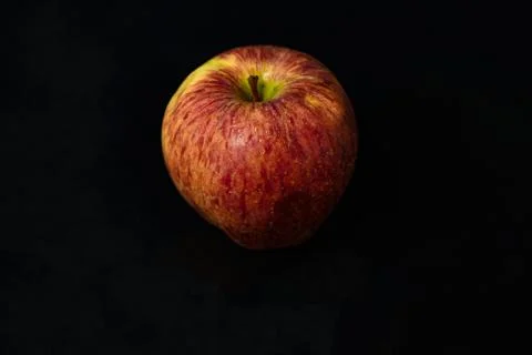 Apples on isolated black background Stock Photos