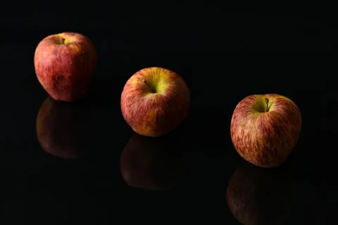 Apples on isolated black background Stock-Fotos