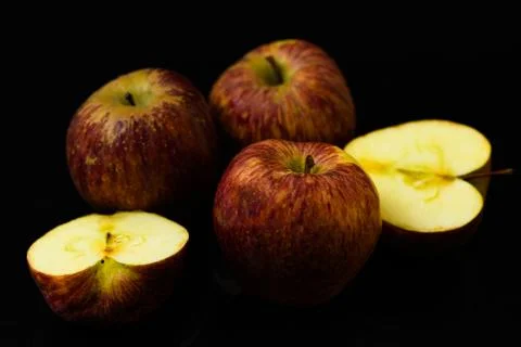 Apples on isolated black background Stock Photos