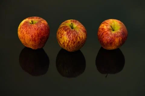 Apples on isolated black background Stock-Fotos