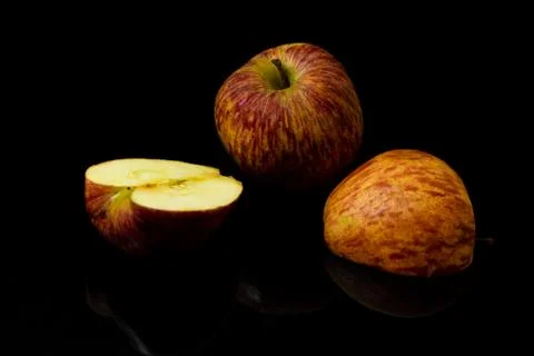 Apples on isolated black background Stock Photos