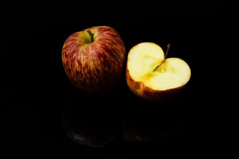 Apples on isolated black background Stock Photos