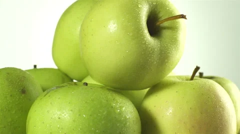 Apples isolated rotating on white background Stock Footage 62414769