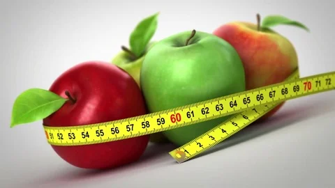 Apples with a Measuring Tape Stock Footage 69116086