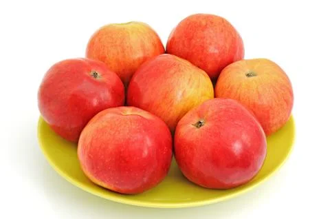 Apples on the plate Stock Photos