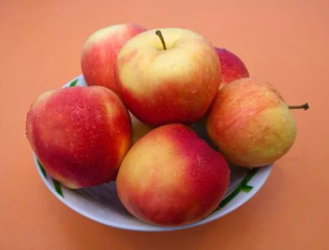 Apples in a plate Stock Photos