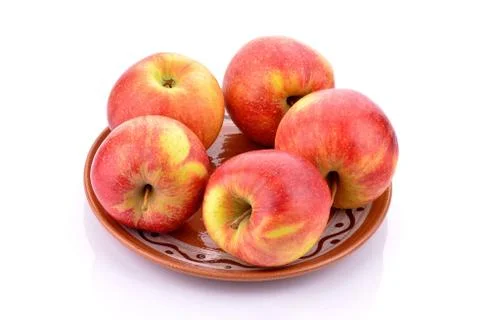 Apples on a plate Stock Photos