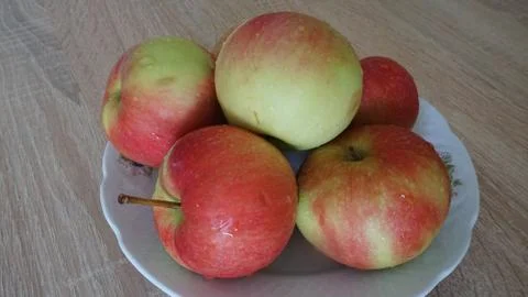 Apples on a plate Stock Photos