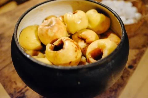 Apples in the pot on the table Stock Photos